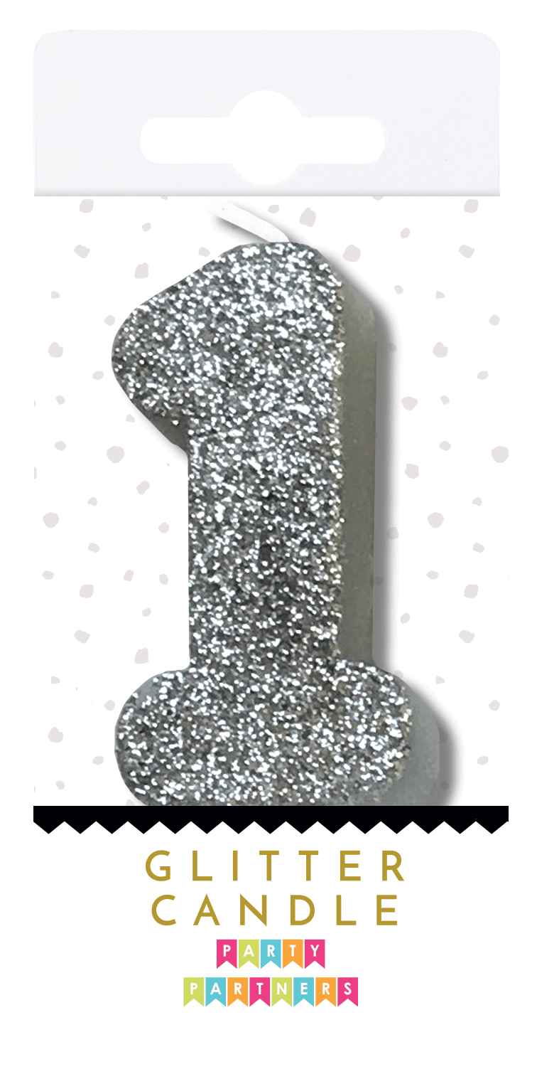 Silver glitter candle from Party Partners with a shiny, sparkly surface, perfect for festive celebrations.