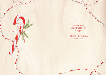 Pictura seasonal Christmas card featuring a colorful candy cane gift and a father figure, perfect for holiday greetings.