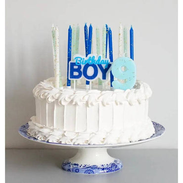 Set of Party Partners candles featuring blue and gold glitter designs, perfect for elegant celebrations and decorative displays.