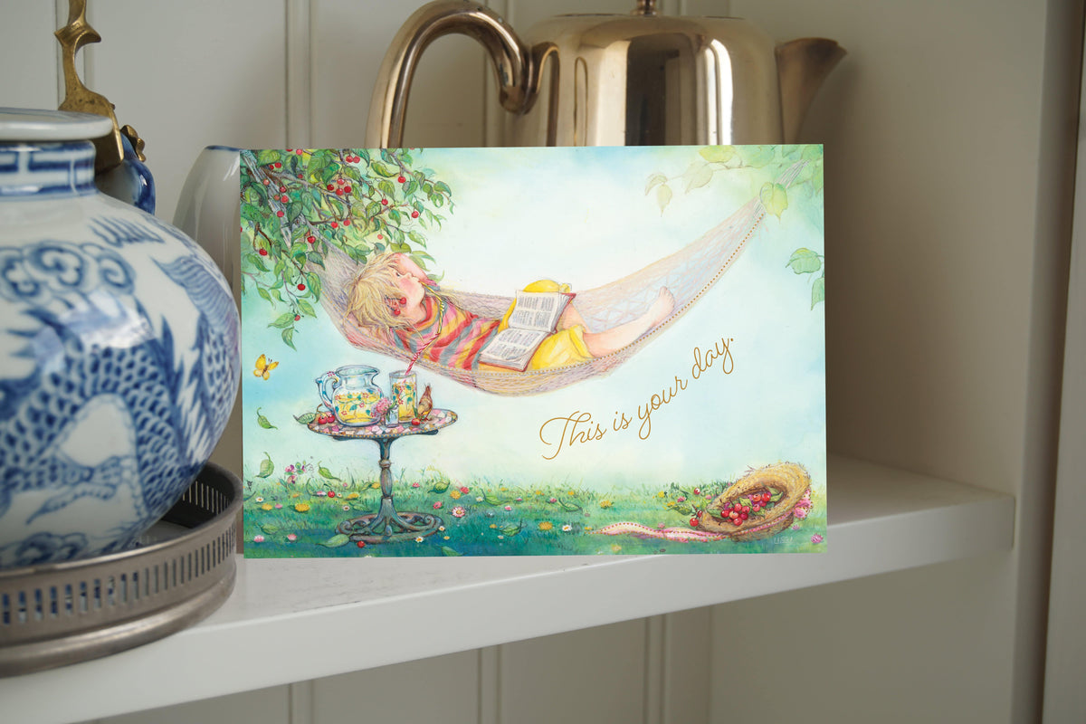 Relaxing Hammock Birthday Card by Pictura featuring a peaceful scene with a hammock and nature background.