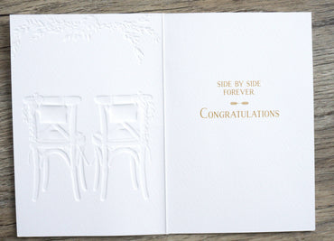 Pair of wedding card chairs from Pictura, featuring elegant design on a white background for an everyday card occasion.