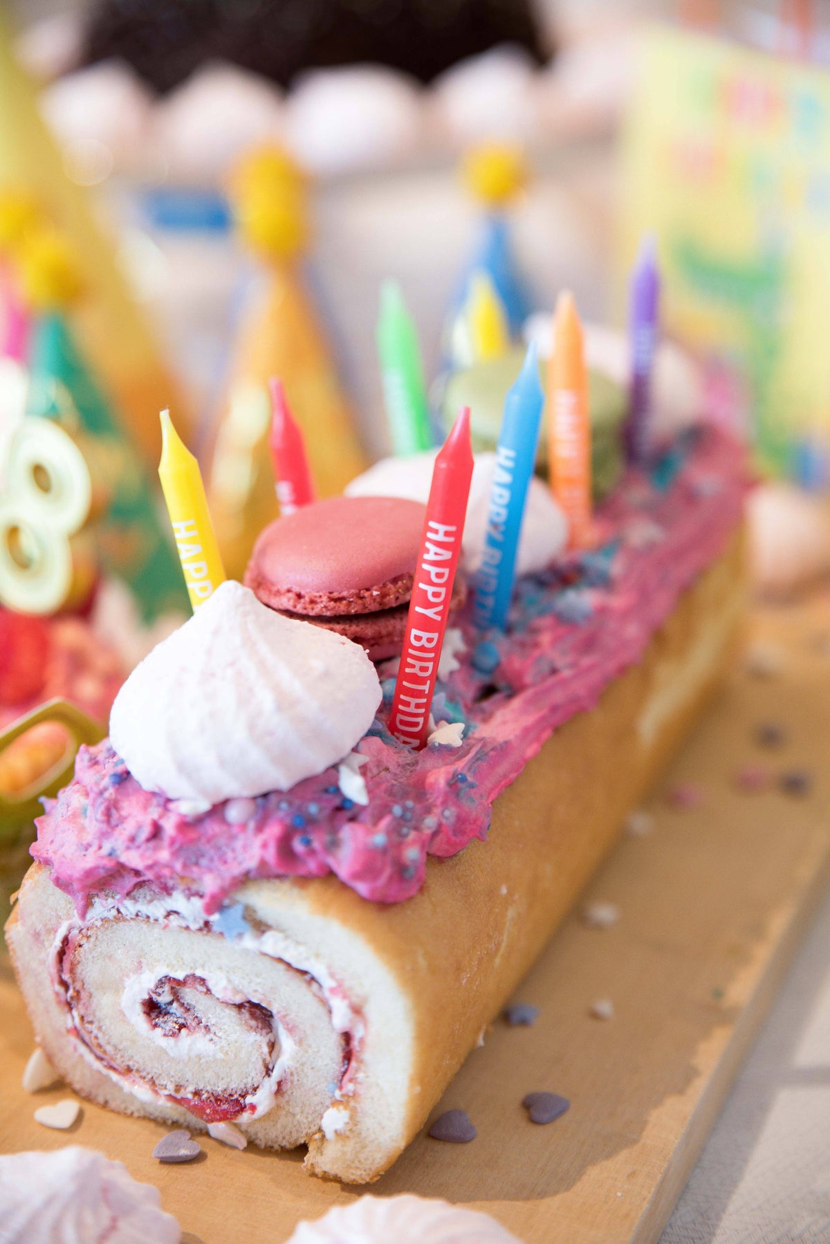 Party Partners 24-piece Happy Birthday candle set with colorful wax candles arranged for celebration.