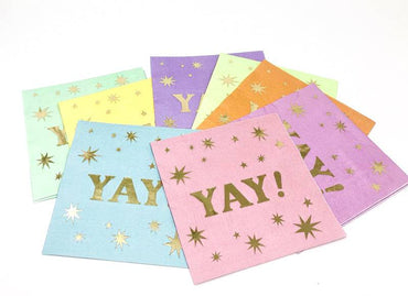 Pastel-colored YAY! Din napkins by Party Partners, featuring playful design, perfect for celebrations and party table settings.