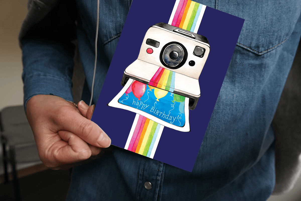 Pictura Polaroid Camera birthday card from the Everyday Cards collection, featuring a colorful Polaroid camera illustration.
