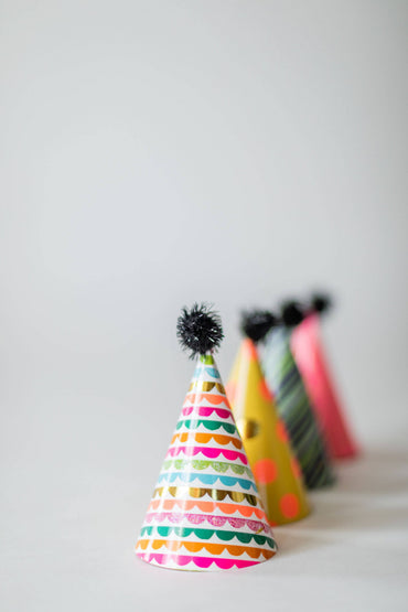 Colorful mini party hats by Party Partners, perfect for celebrations and festive gatherings.