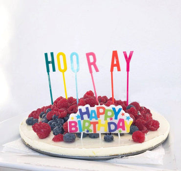 Party Partners Happy Birthday candle block, decorative birthday candles with "Happy Birthday" message, perfect for celebration cakes.