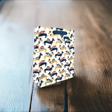 Large Clever Sausage gift bag by Love Vivid featuring a playful sausage design and spacious interior for gift packaging.