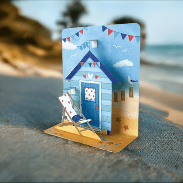 Pictura house on beach small pop-up card featuring a detailed seaside house scene with ocean and sand elements.