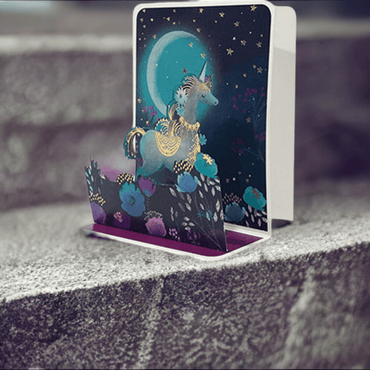 Colorful unicorn pop-up card by Pictura featuring a detailed, vibrant unicorn design that stands upright when opened.