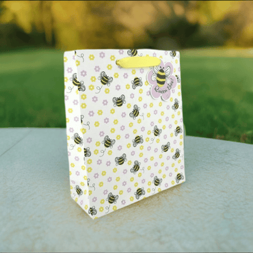 Large Queen Bee Gift Bag by Love Vivid featuring vibrant bee and honeycomb design, perfect for special occasions.