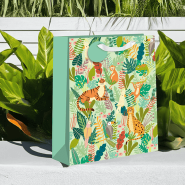 Large Jungle-themed Gift Bag by Pictura with vibrant jungle animal and plant illustrations for special occasions.