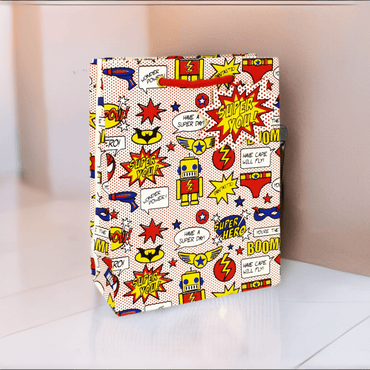 Colorful Super Hero Med Bag gift bag by Love Vivid, featuring cartoon hero designs, perfect for gift packaging.