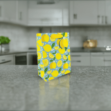Love Vivid Lemons Med Gift Bag featuring vibrant lemon illustrations, perfect for gifting and special occasions.