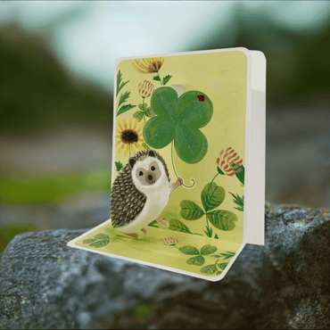 Small hedgehog pop-up card by Pictura featuring a detailed, colorful paper design with a charming hedgehog figure.