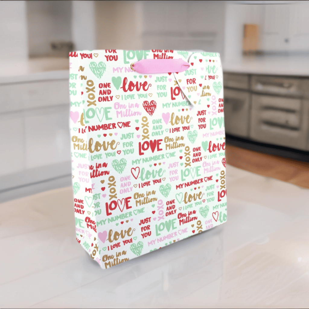 Large Love Vivid gift bag from the Just for You collection with colorful floral and heart patterns.