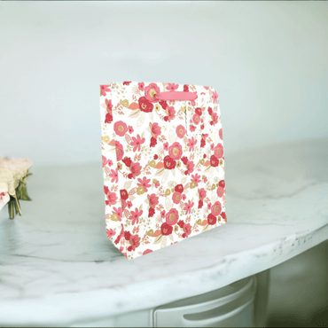 Large Love Vivid Cote Floral gift bag with vibrant floral design and sturdy handles, perfect for special occasions.