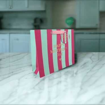 Large Love Vivid Mother's Day striped gift bag with floral and heart patterns, perfect for special occasion gift wrapping.