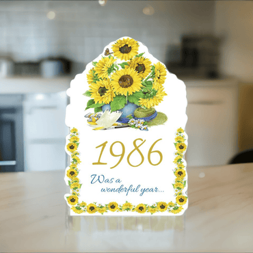 Pictura Year of Birth 1986 card featuring stylish design with the year 1986 displayed prominently on a decorative background.