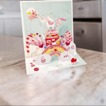 Pictura unicorn large pop-up card featuring a colorful, detailed 3D unicorn design on white cardstock.
