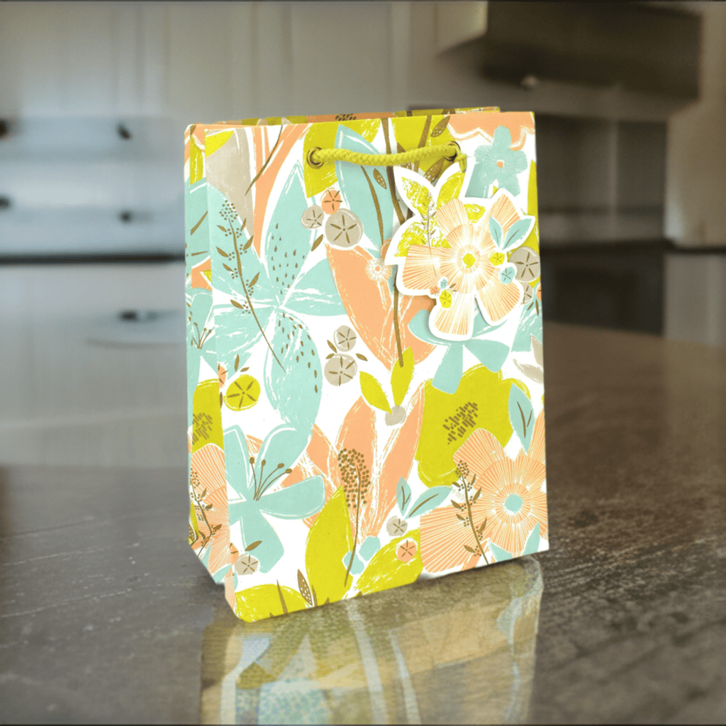 Love Vivid Tex Floral Med Gift Bag featuring vibrant floral patterns, perfect for gifting occasions.