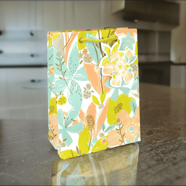 Love Vivid Tex Floral Med Gift Bag featuring vibrant floral patterns, perfect for gifting occasions.
