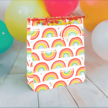 Colorful rainbow large gift bag by Love Vivid with handles, suitable for gift wrapping and special occasions.
