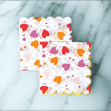 Party Partners heart-shaped napkins with a pink and red heart pattern, perfect for romantic or celebration occasions.