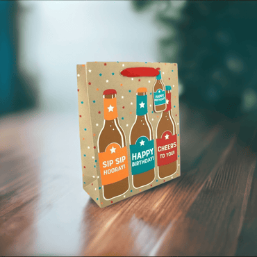 Large birthday beer gift bag by Love Vivid featuring colorful birthday-themed designs and sturdy handles for easy carrying.