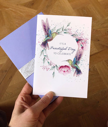 Pictura hummingbird wreath birthday card featuring colorful floral design, ideal for celebrating special occasions.