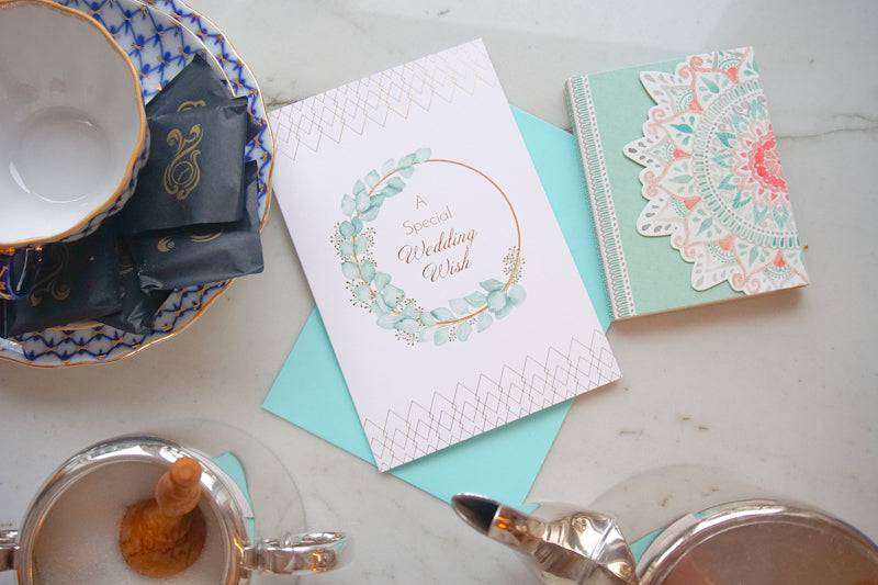 Gold hoop wedding card from Pictura featuring elegant round design, perfect for special occasion greetings.