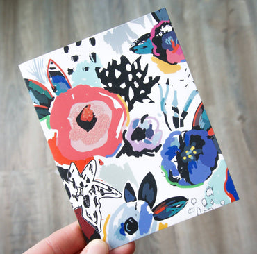 Close-up of a colorful Flowers Birthday Card from Me To You by Pictura, featuring vibrant floral illustrations on a white background.
