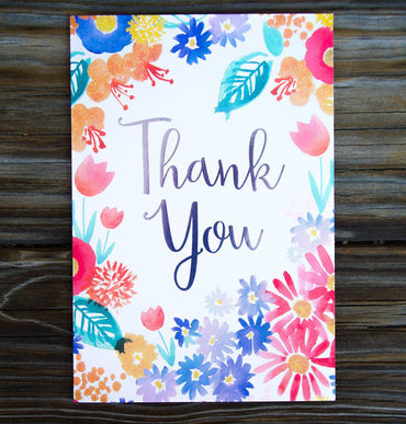 Spring floral thank you card by Pictura featuring colorful flower illustrations on a white background.