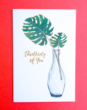 Tall glass with stems and a "Thinking of You" card, ideal for everyday occasions, by Pictura.