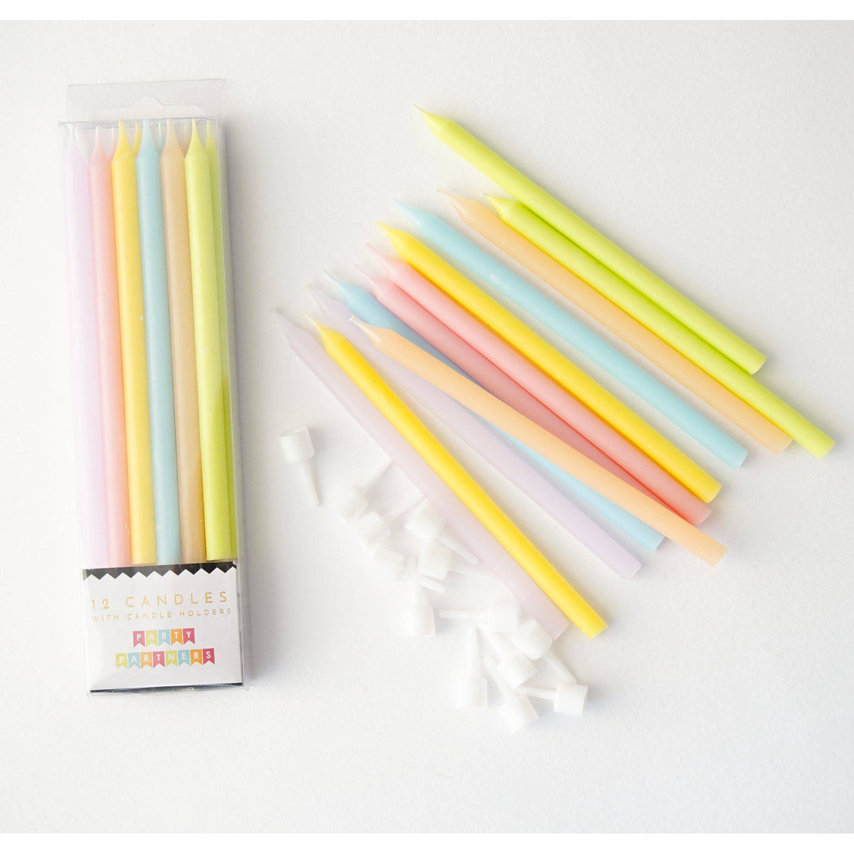 Set of pastel rainbow candles from Party Partners, featuring colorful, decorative candles arranged on a clean surface.