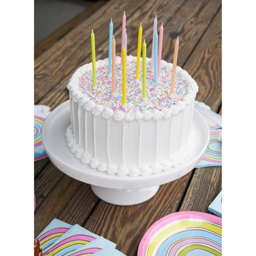 Set of pastel rainbow candles from Party Partners featuring colorful, decorative candles arranged in a vibrant display.