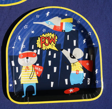 Colorful superhero-themed party plates by Party Partners featuring vibrant comic book designs for children's celebrations.
