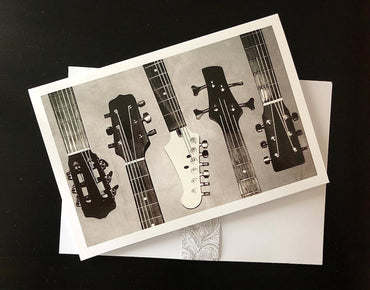 Pictura Guitars Birthday Card featuring a colorful illustration of an acoustic guitar, perfect for celebrating music lovers.
