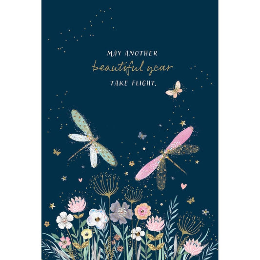 Close-up of a Pictura Dragonfly Birthday Card featuring a colorful dragonfly illustration on a white background.