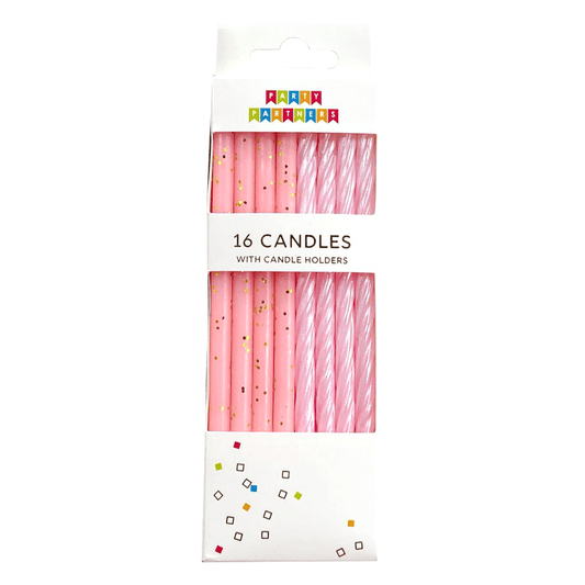 Set of 16 pink gradient candles from Party Partners, arranged in a decorative display with soft lighting.