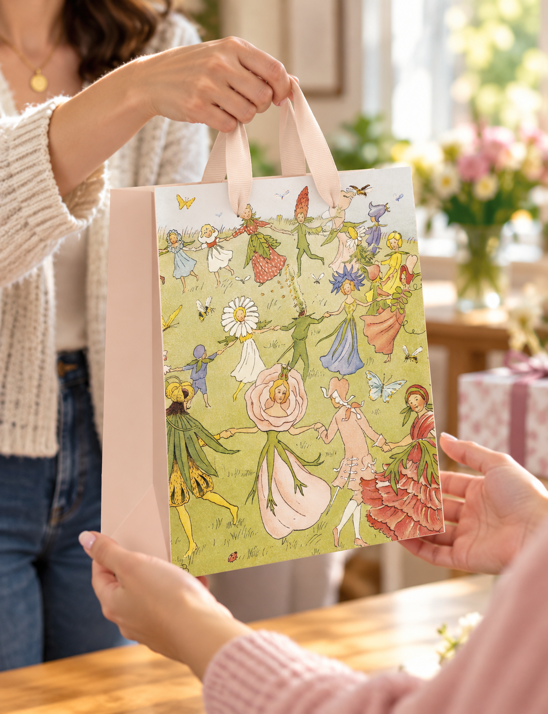 Medium floral gift bags featuring Dancing Flower Elsa Beskow design by AB PICTURA, decorated with colorful flowers and whimsical patterns.