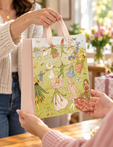Medium floral gift bags featuring Dancing Flower Elsa Beskow design by AB PICTURA, decorated with colorful flowers and whimsical patterns.