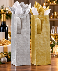 Gold glitter dots gift bag from AB PICTURA, elegant wine bottle gift bag with silver and gold design, perfect for special occasions.