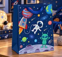 Medium AB PICTURA astronaut gift bag featuring space-themed design with an astronaut illustration on a white background.