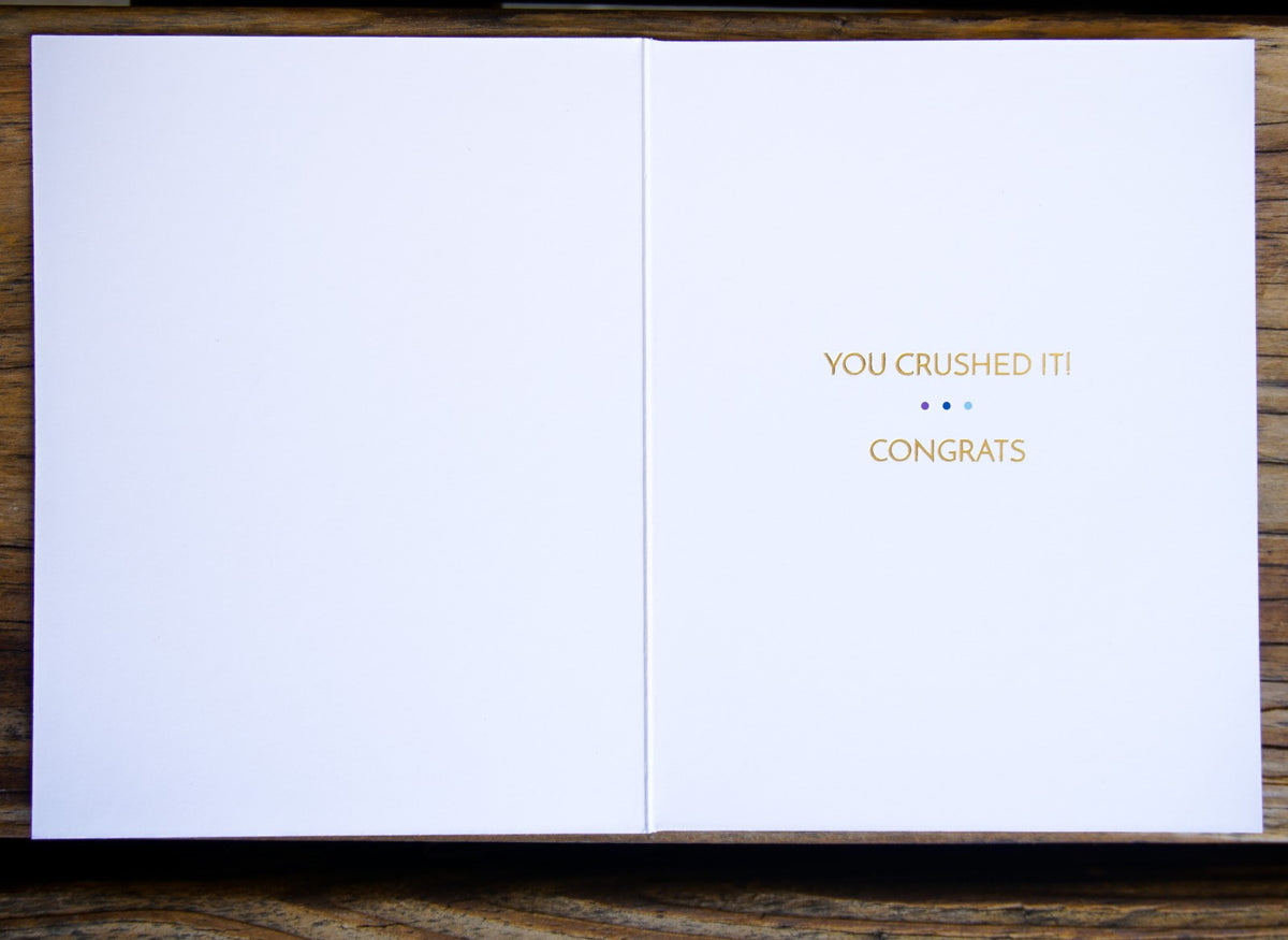 Pictura "You Crushed It!" congratulations card featuring colorful design and bold lettering. Perfect for celebrating achievements.