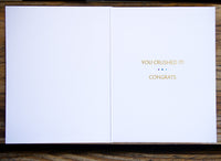 Pictura "You Crushed It!" congratulations card featuring colorful design and bold lettering. Perfect for celebrating achievements.